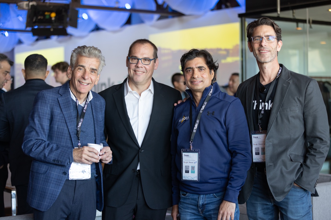 Founders and operators networking at a past AI event